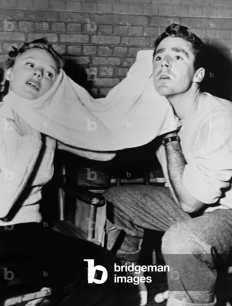 GOOD NEWS, from left: June Allyson, Peter Lawford after a dance rehearsal on set, 1947