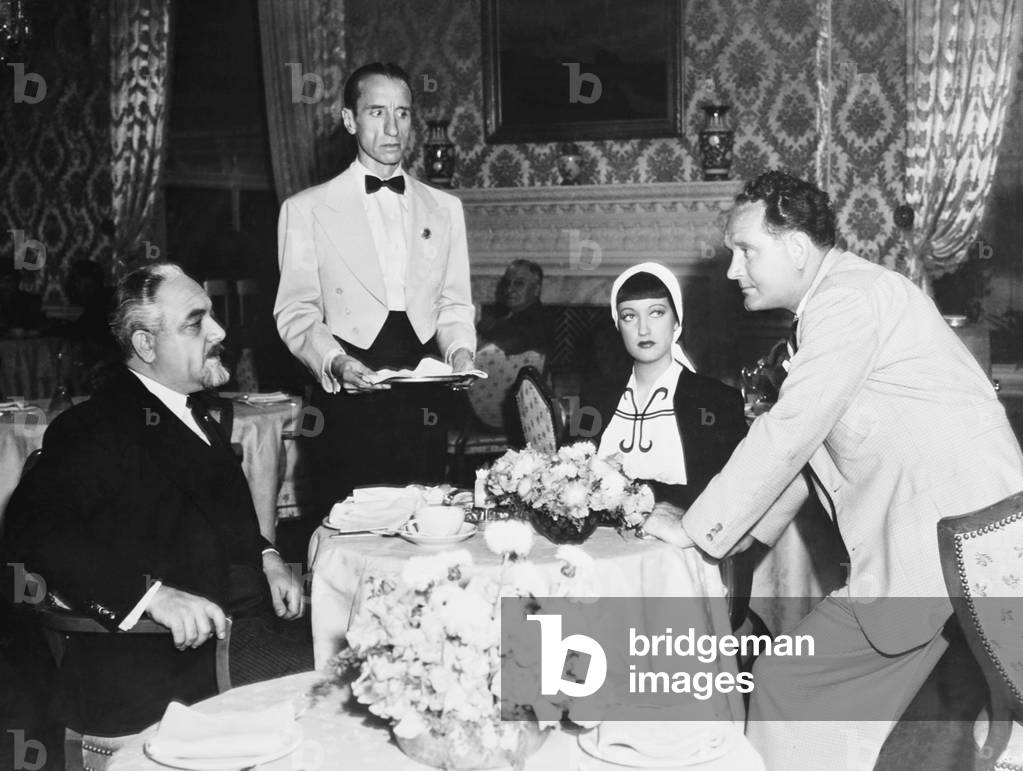 DISPUTED PASSAGE, seated from left: Akim Tamiroff, Dorothy Lamour, director Frank Borzage on set, 1939