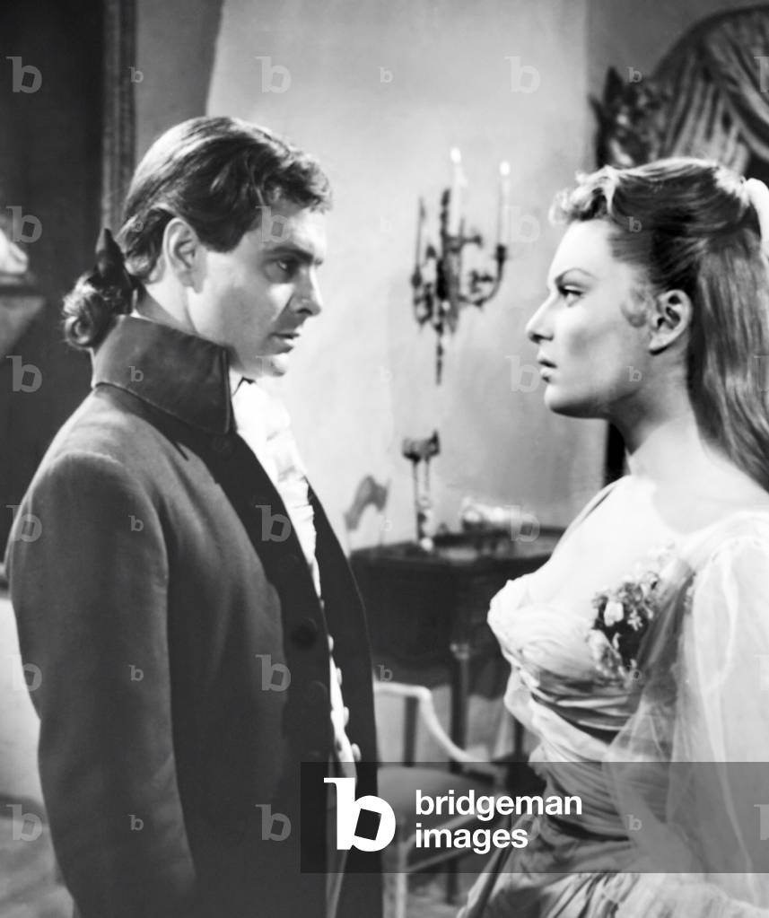 DANGEROUS EXILE, from left, Louis Jourdan, Belinda Lee, 1957