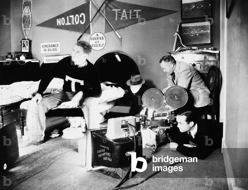 GOOD NEWS, from left: Delmer Daves, co-directors Edgar J. MacGregor, Nick Grinde (on chair), cinematographer Percy Hilburn (on floor) on set, 1930