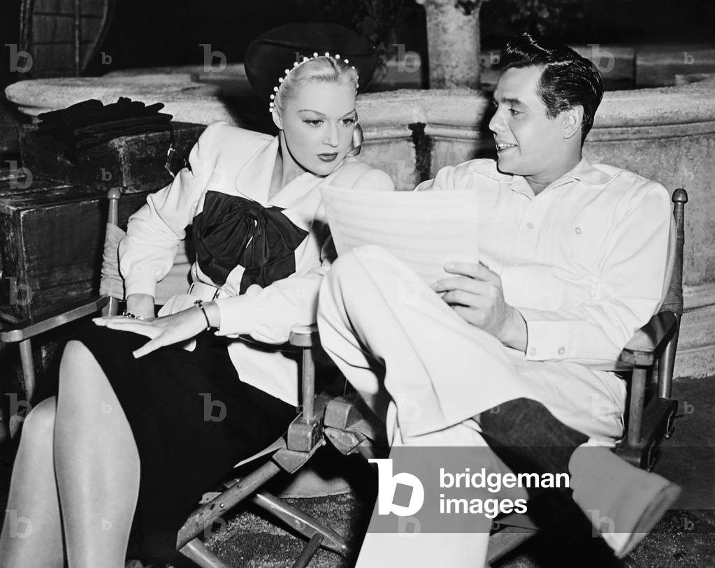 CUBAN PETE, from left: Joan Shawlee aka Joan Fulton, Desi Arnaz on set, 1946