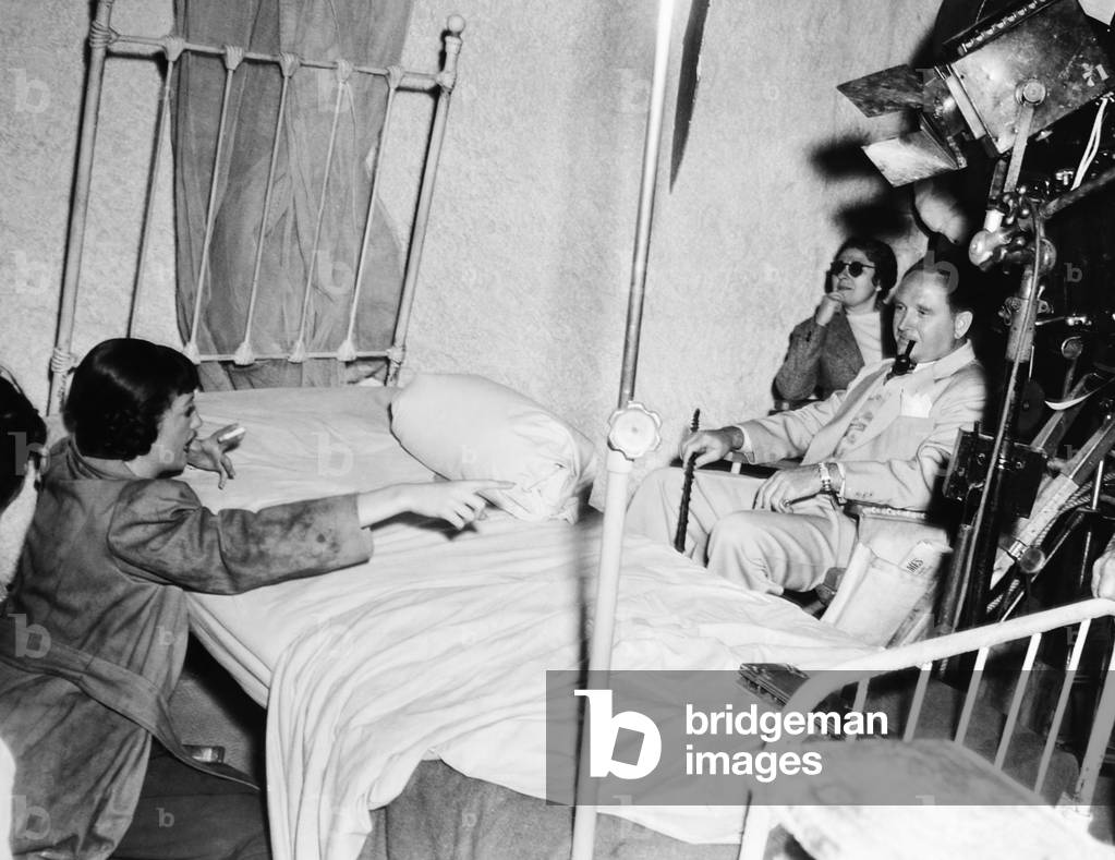 DISPUTED PASSAGE, from left: Dorothy Lamour, director Frank Borzage filming on set, 1939