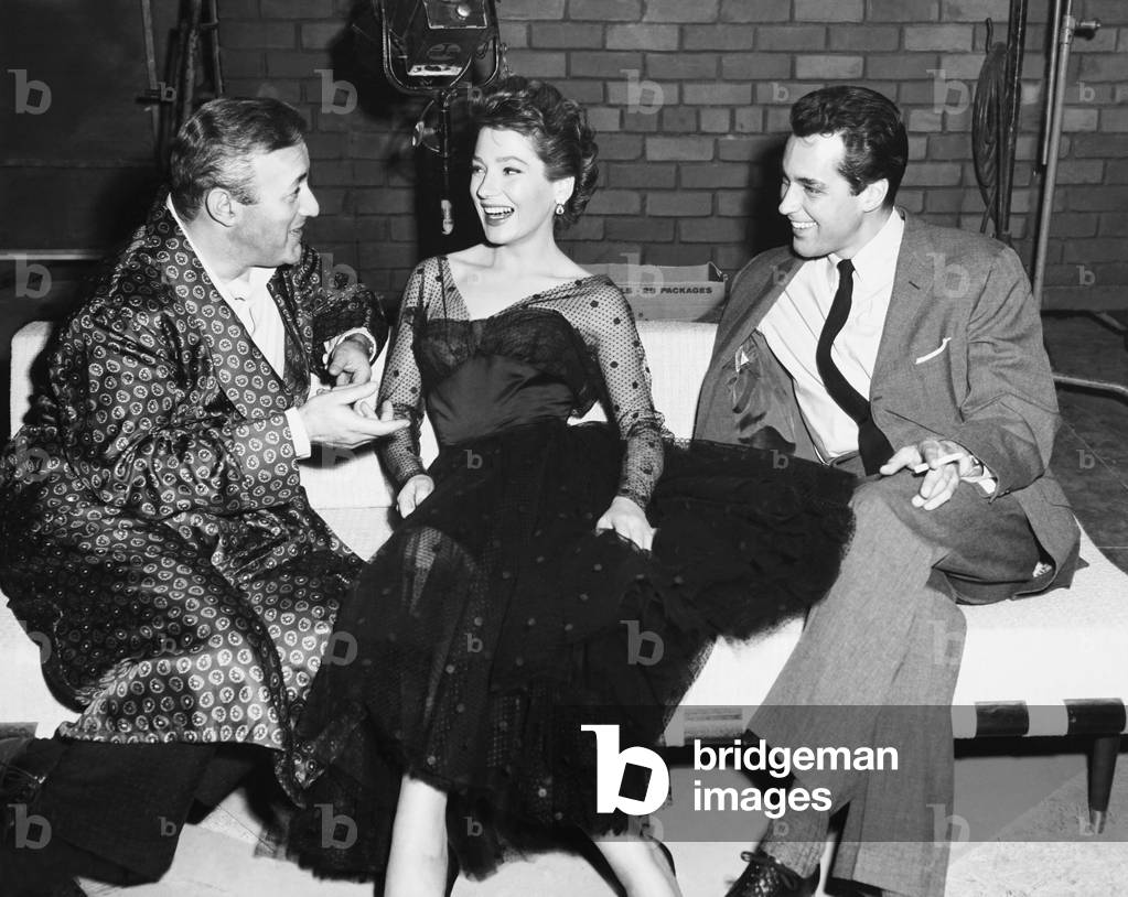 THE GARMENT JUNGEL, from left: Lee J. Cobb, Valerie French, Kerwin Mathews on set, 1957