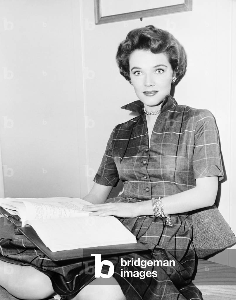 FAST COMPANY, Polly Bergen with her script on set, 1953