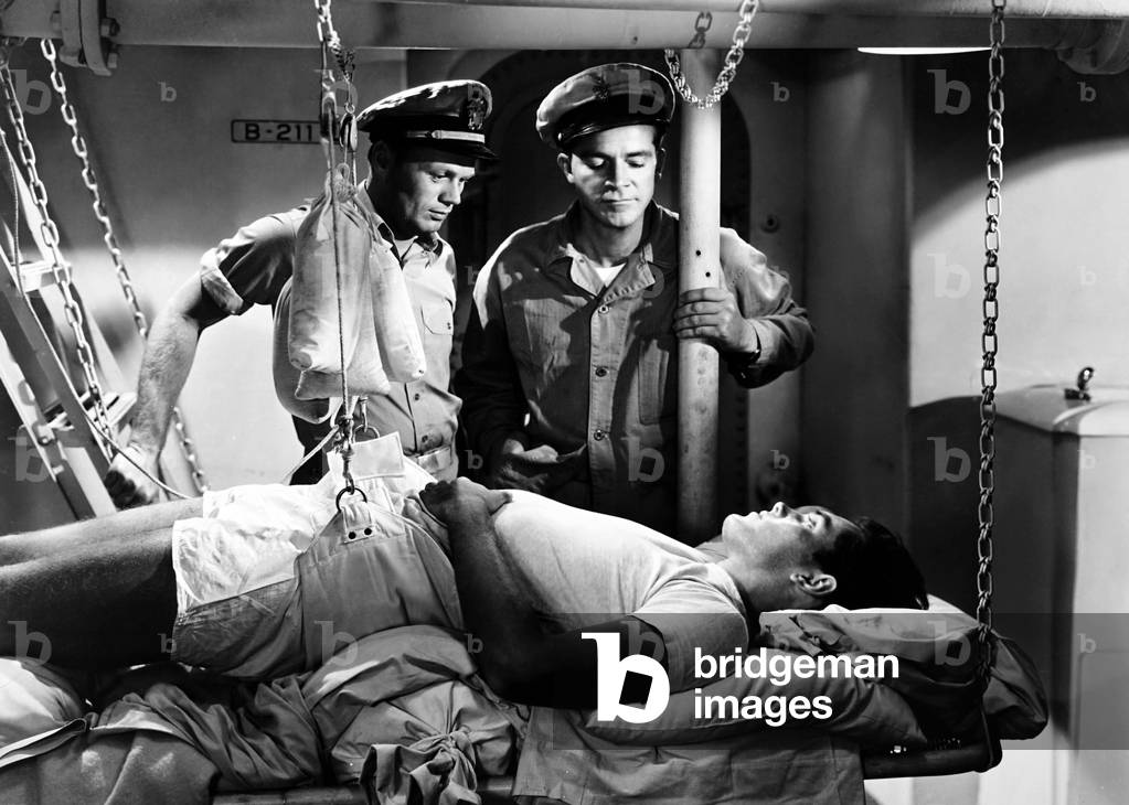THE FROGMEN, from left, Richard Widmark, Jeffrey Hunter (lying down), Dana Andrews, 1951