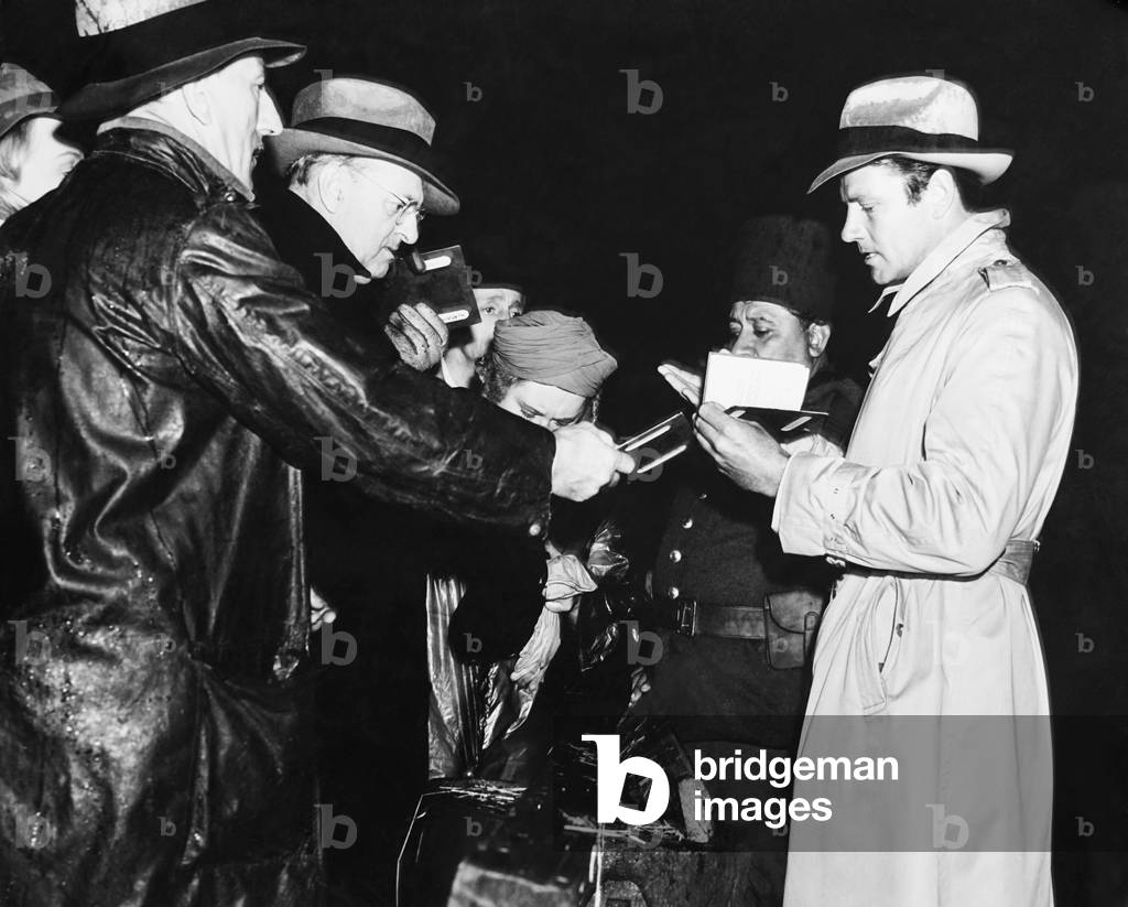 ESPIONAGE AGENT, Granville Bates (second from left), Nana Bryant (face hidden), Joel McCrea (right), 1939