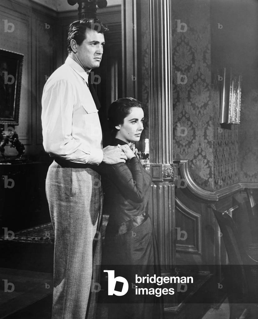 GIANT, from left: Rock Hudson, Elizabeth Taylor, 1956