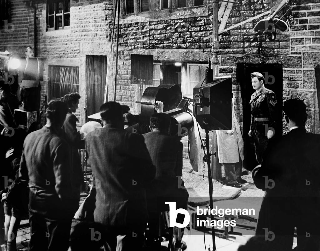 THE CURE FOR LOVE, Robert Donat (right) filming on set, 1949