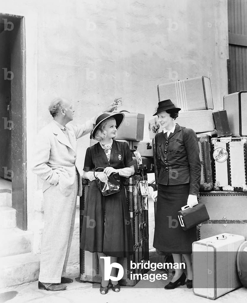 ARTISTS AND MODELS ABROAD, from left: director Mitchell Leisen, Joan Bennett, fashion consultant Lillian Fischer on set, 1938