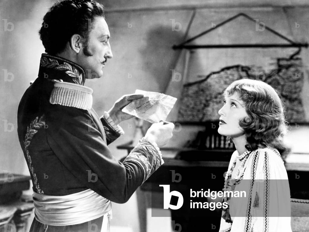 THE FIREFLY, from left, Warren William, Jeanette MacDonald, 1937