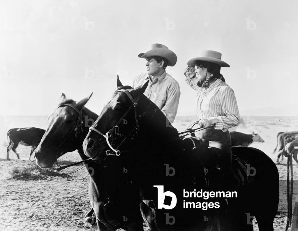 GIANT, from left: Rock Hudson, Elizabeth Taylor, 1956