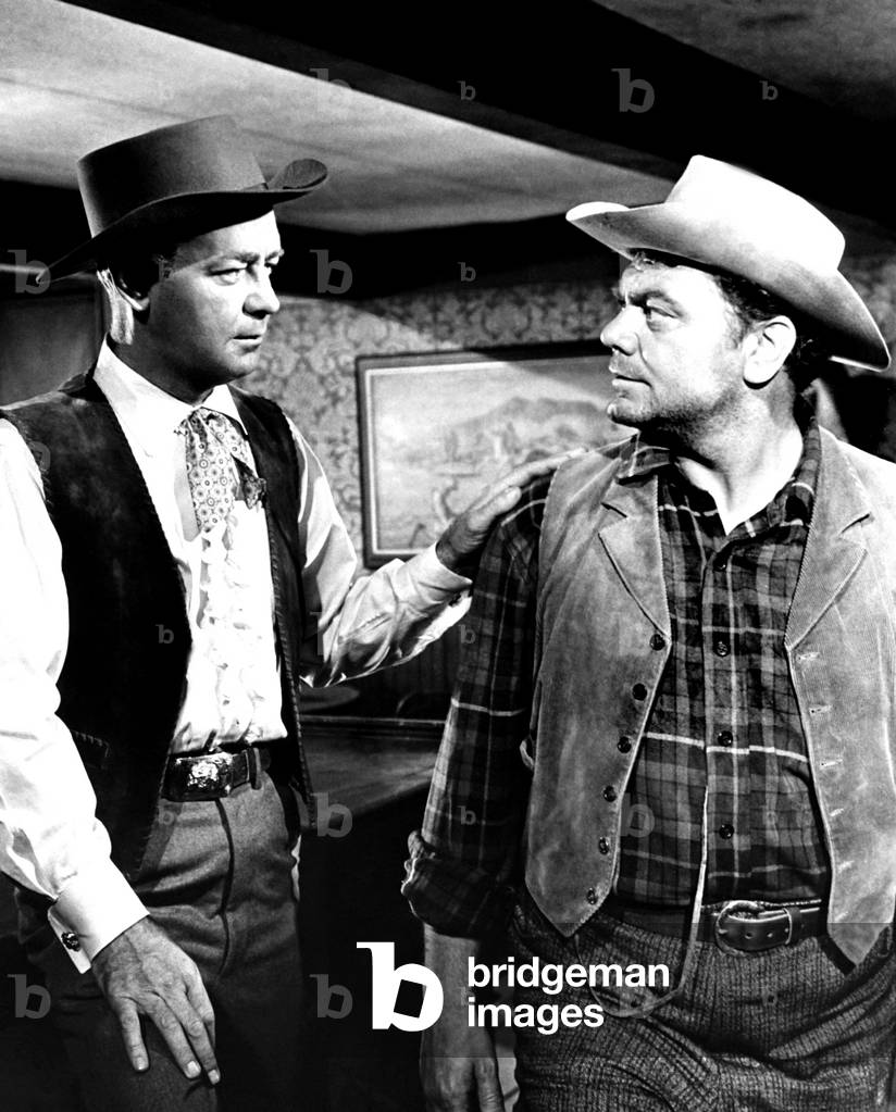 THE BADLANDERS, from left, Alan Ladd, Ernest Borgnine, 1958
