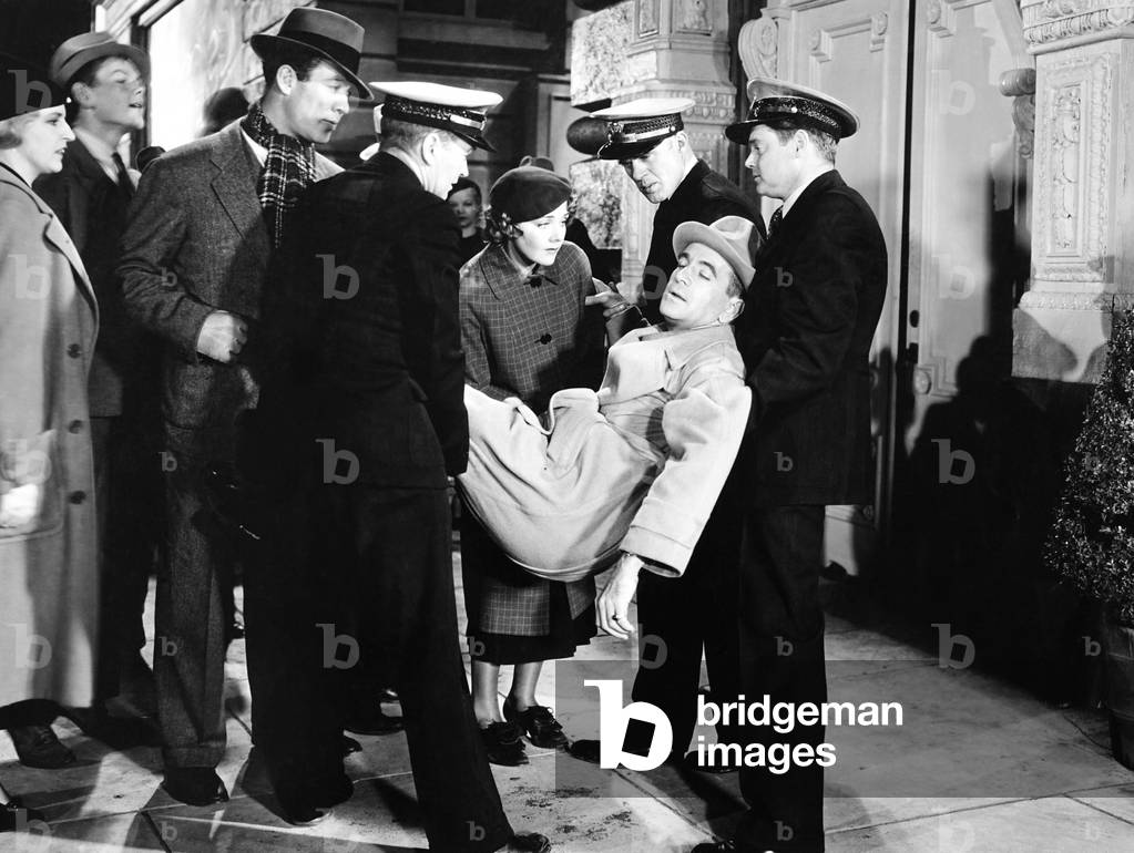 GO INTO YOUR DANCE, Ward Bond (with muffler), Ruby Keeler (center), Al Jolson (being carried), 1935