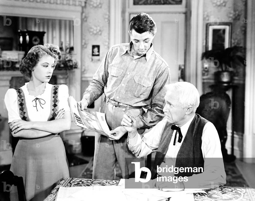 FOLLOW THE BAND, from left, Anne Rooney, Robert Mitchum, Samuel S. Hinds, 1943
