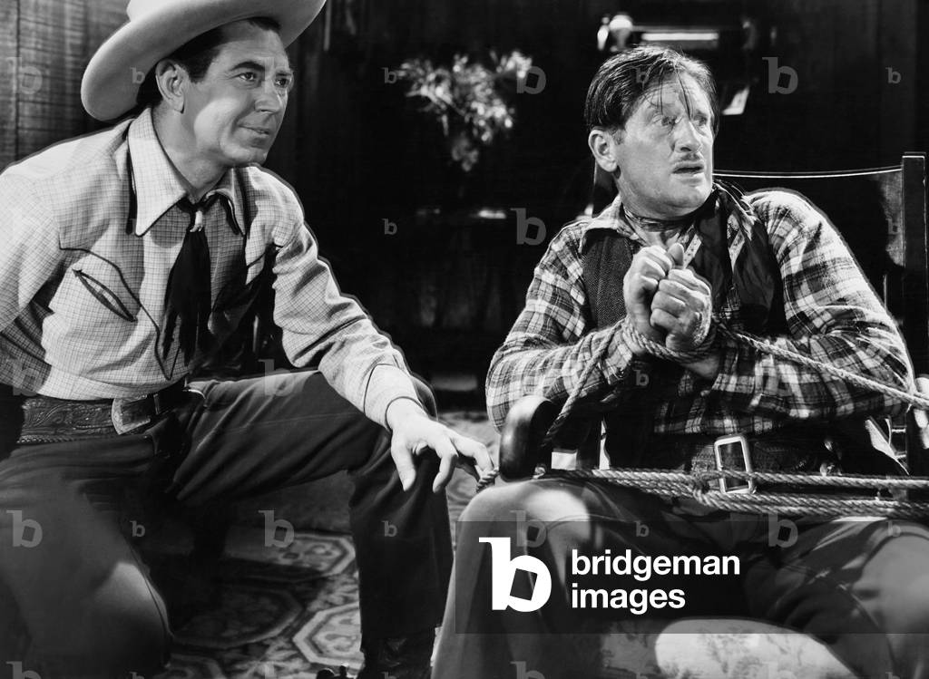 GHOST GUNS, from left: Johnny Mack Brown, Jack Ingram, 1944