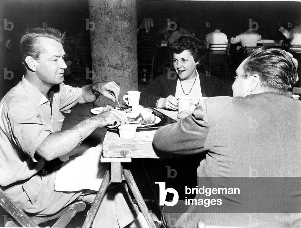 A CRY IN THE NIGHT, Alan Ladd (who narrates the film) and wife Sue Carol, on-set, 1956