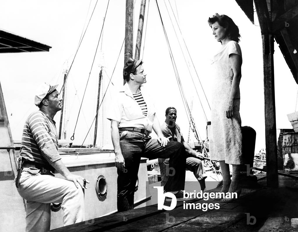 FIRE DOWN BELOW, from left, Robert Mitchum, Jack Lemmon, Edric Connor, Rita Hayworth, 1957
