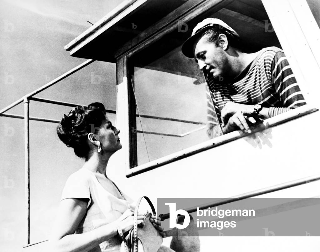 FIRE DOWN BELOW, from left, Rita Hayworth, Robert Mitchum, 1957