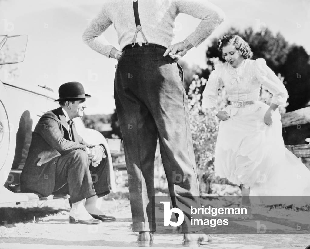 COLLEGE SWING, from left: Edward Everett Horton, Gracie Allen on set, 1938