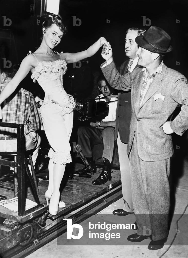 EXCUSE MY DUST, front from left: Sally Forrest, director Roy Rowland on set, 1951