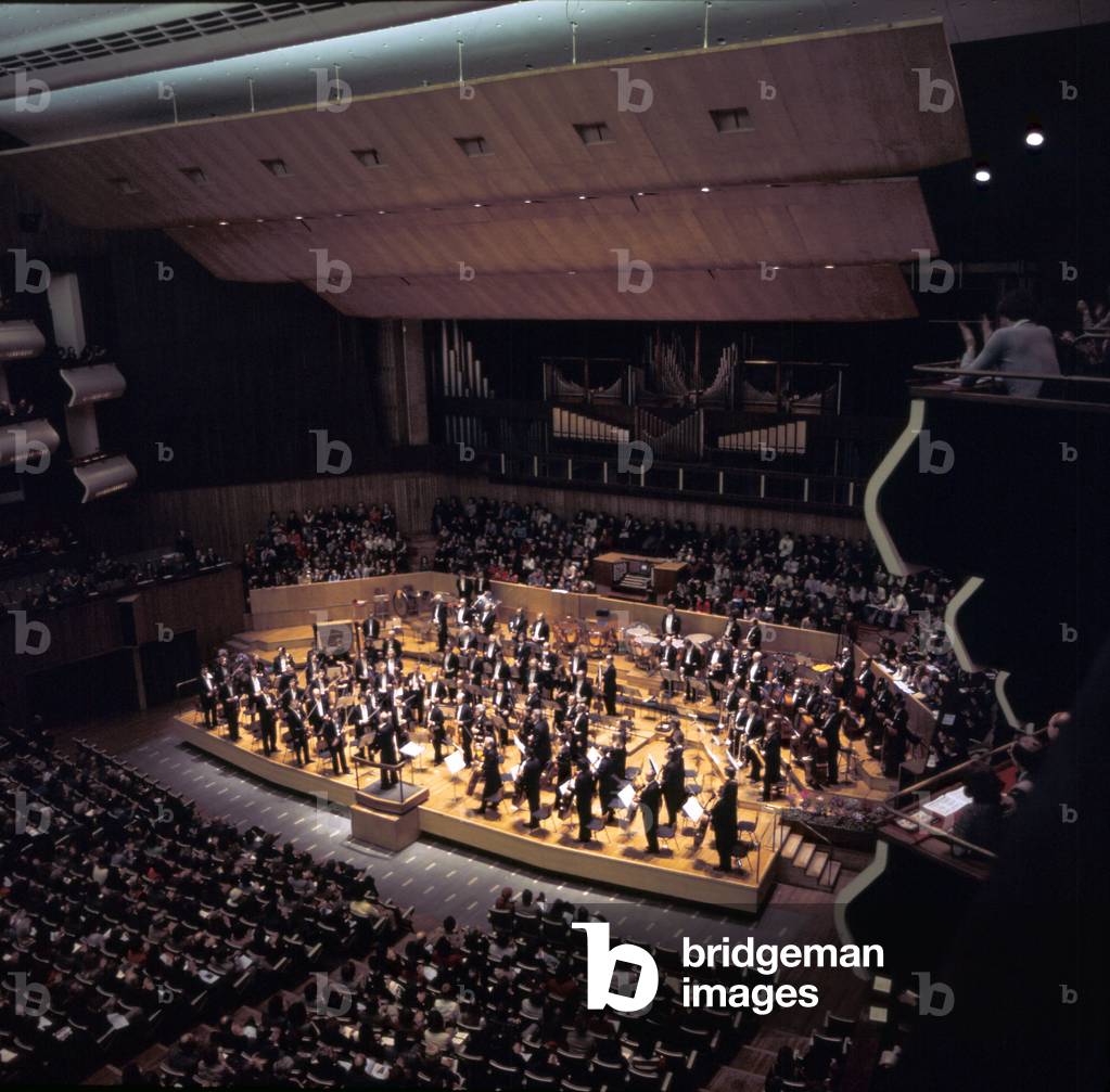 Orchestra standing to accept