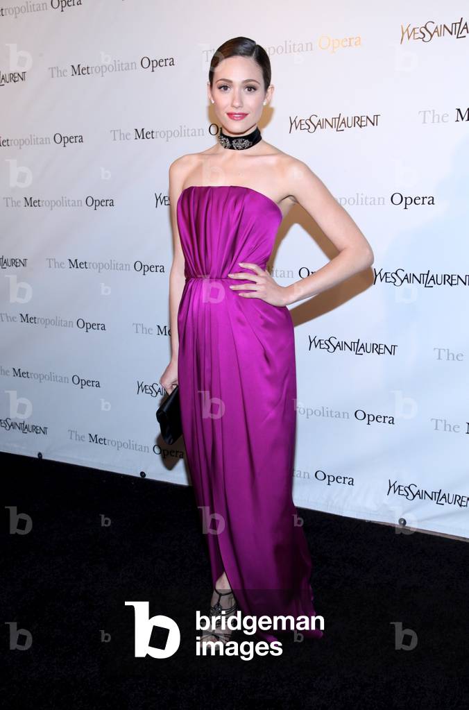 Image of Emmy Rossum (wearing an Yves Saint Laurent gown) at arrivals
