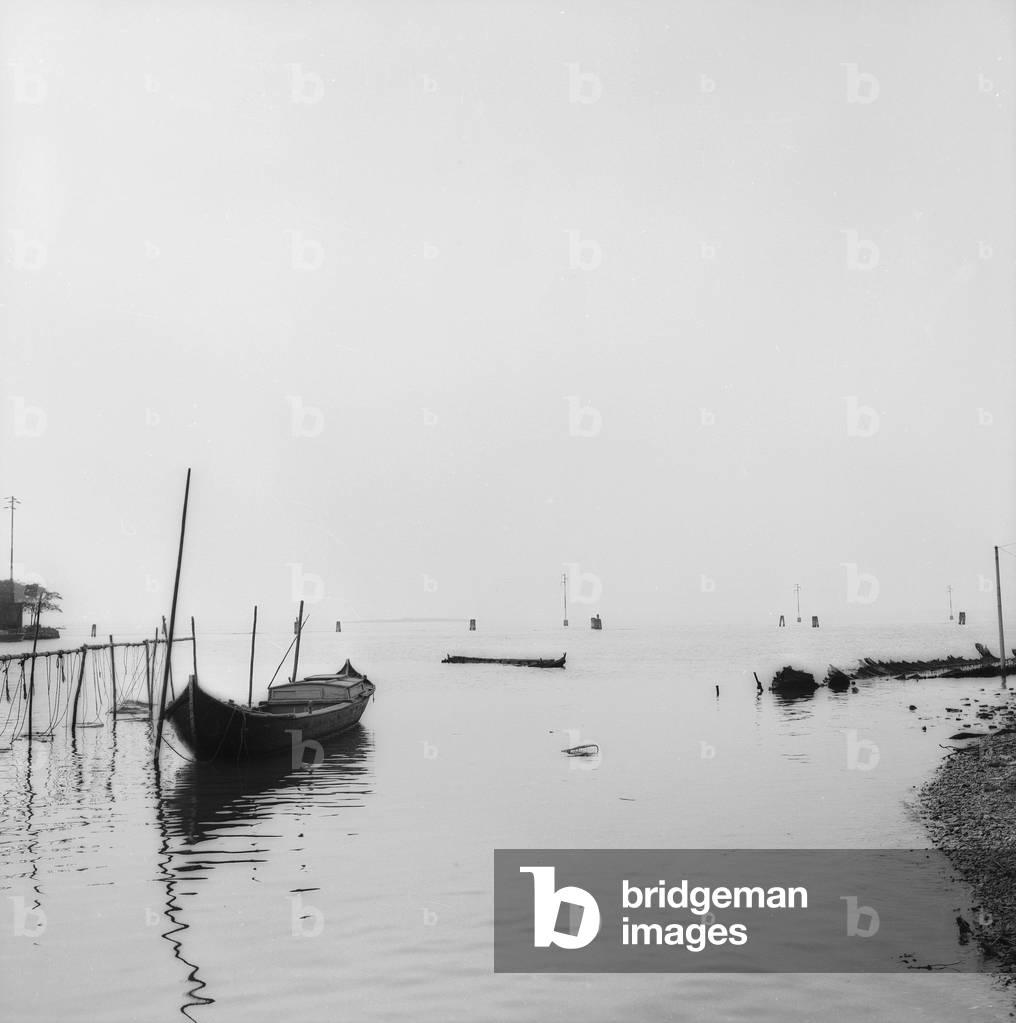 Boat in the lagoon (b/w photo)