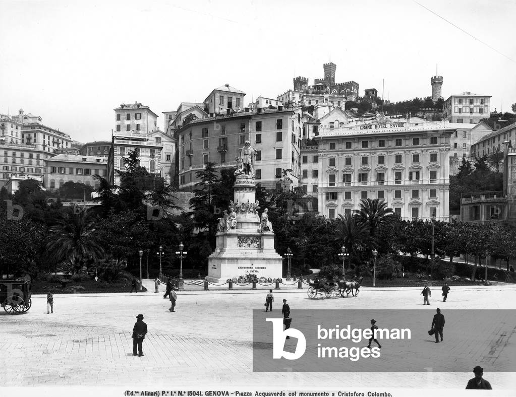 Busy view of Acquaverde in Genoa; in the foreground is a monument to Christopher Columbus.