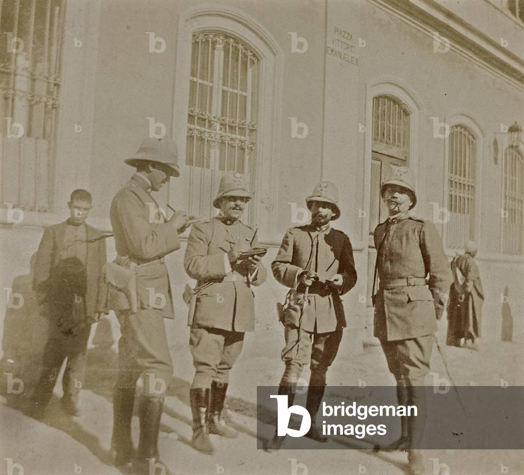World War I-Libya Campaign: group of officers photographed in front of the building of the Military Command in Derna (b/w photo)