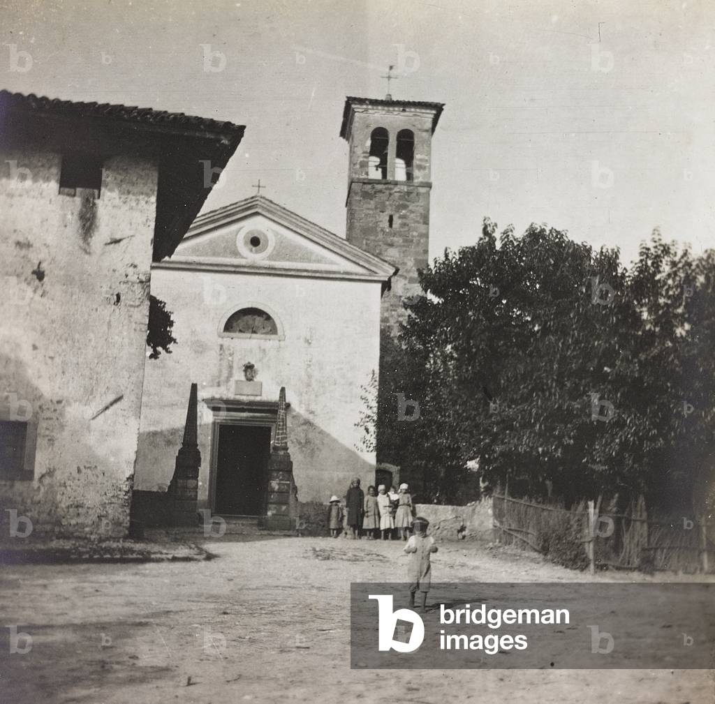 Album of the First World War in Friuli-Venezia Giulia: children in front of the church Soleschiano, 05/1916 (b/w photo)