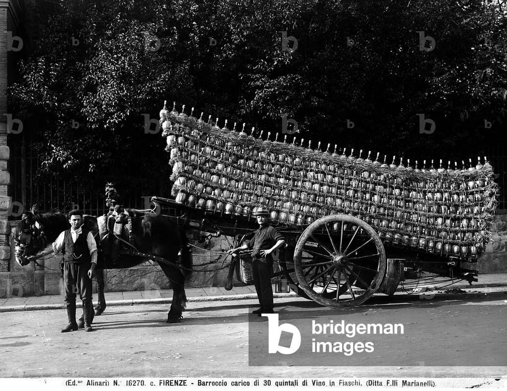 Cart loaded with thirty quintals of wine in flasks, Florence, Italy (photo)