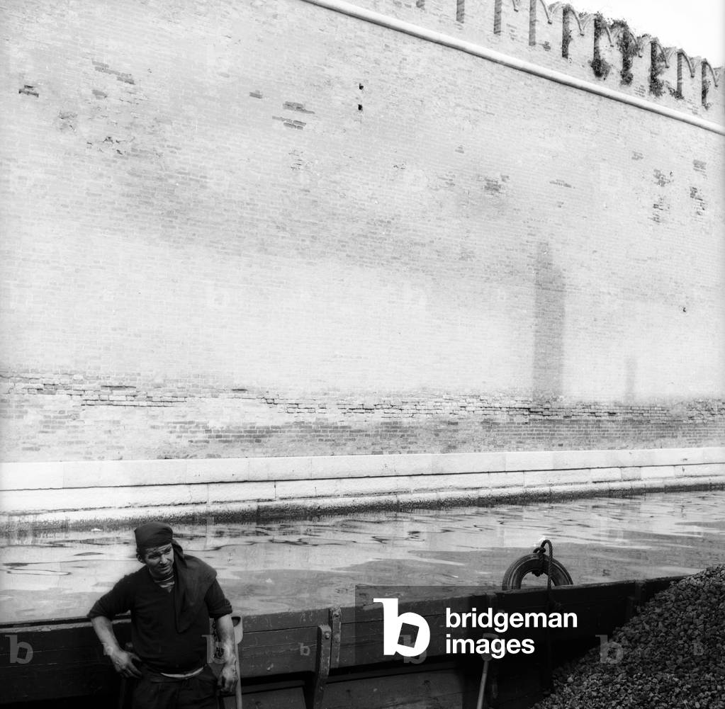Charcoal burner aboard a boat near the Arsenale in Venice (b/w photo)