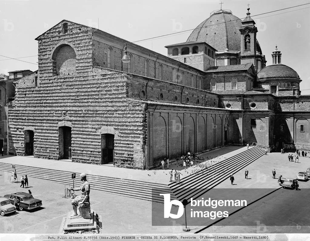 The basilica of San Lorenzo and, in the foreground, the monument to Giovanni dalle bande Nere, Florence