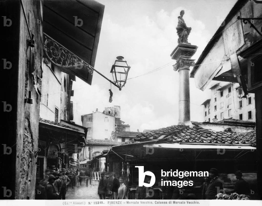 The piazza del Mercato Vecchio, today's piazza della Repubblica, in Florence. The column with the statue of Abbondanza is visible in the foreground