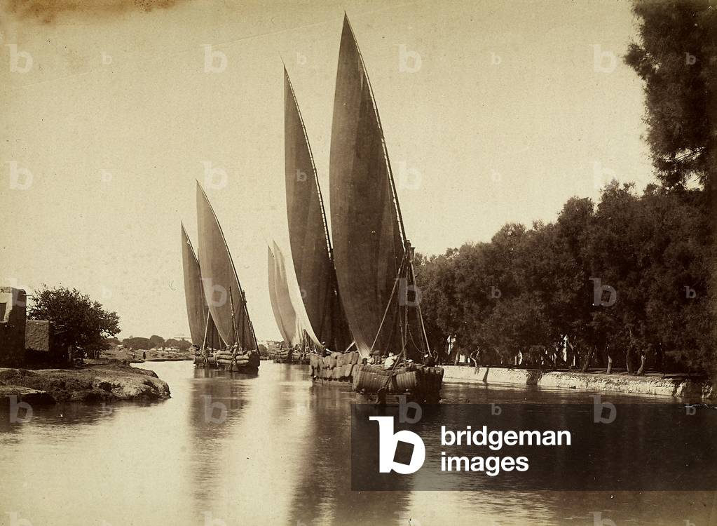Sail boats loaded with hay bales on the Bile