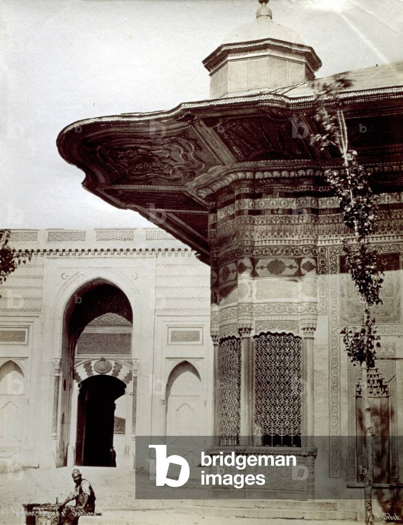 View of the fountain of Ahmet in Istanbul. A turk in popular dress is seated before the fountain, 1870 (print on double-weight paper)