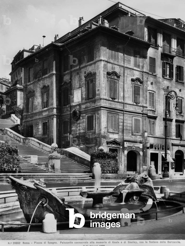 Piazza di Spagna in Rome with the Barcaccia Fountain in the foreground and the Spanish Steps or the Stairway to the Trinità dei Monti in the background