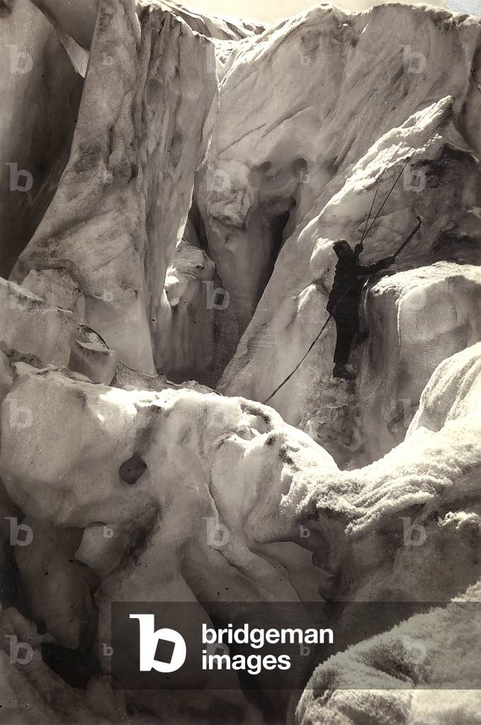 Alpinist in a crevasse between the glaciers of Valgrisenche in Val d'Aosta