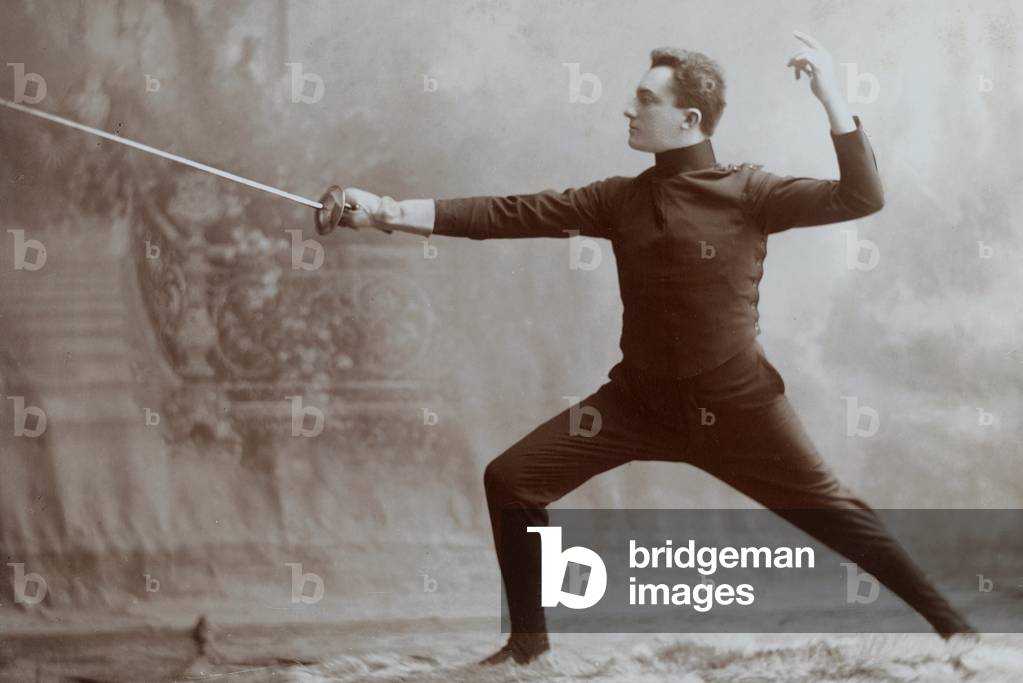 Portrait of a man with a foil