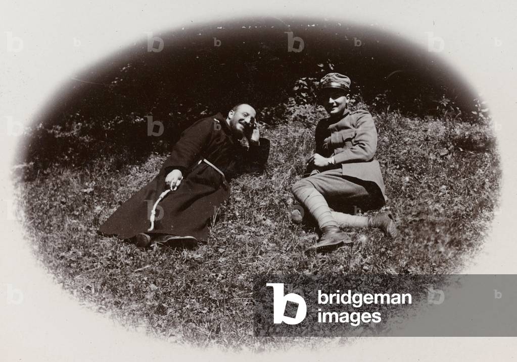 Album of the First World War in Friuli-Venezia Giulia: friar and soldier in the park of Villa Brazzà, home to 17 of the Hospital of war in Soleschiano Manzano, photo taken from the church tower, 05/1916 (b/w photo)