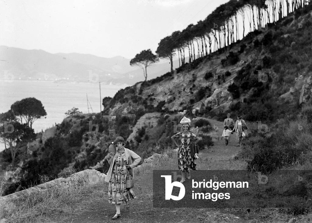 Group of tourists photographed while hiking on the Island of Elba