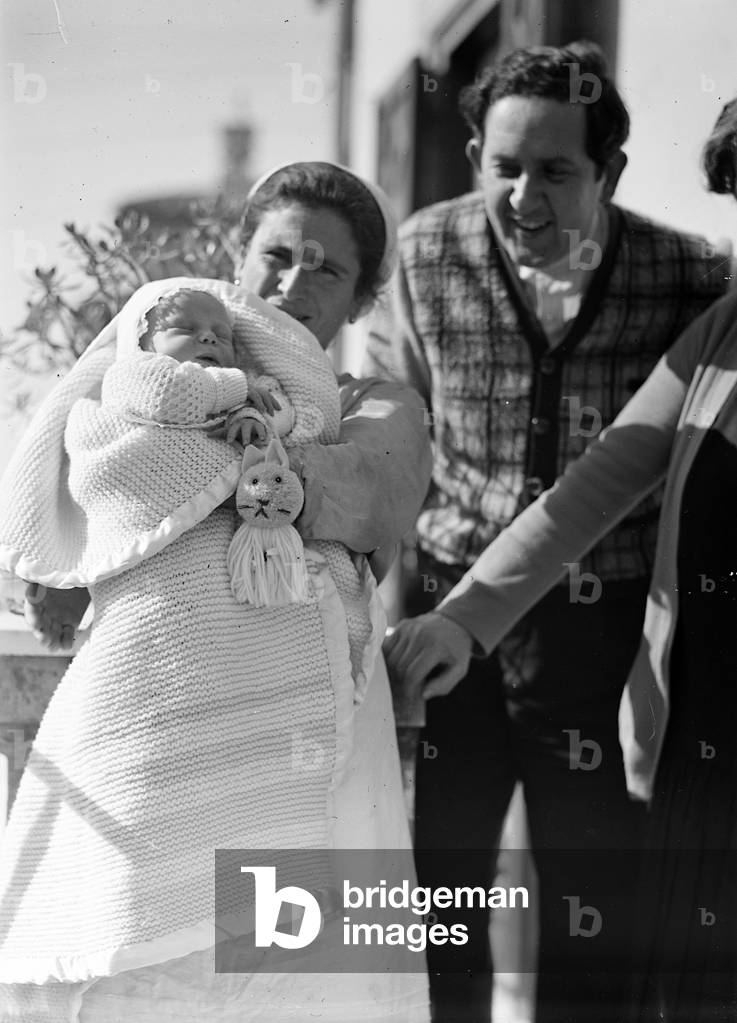 Portrait child on the day of his baptism