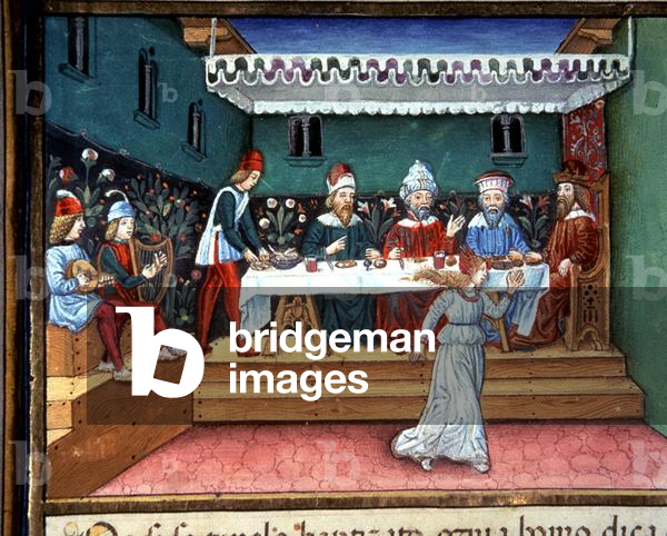 Fol.144r During a Banquet Salome Gives the Head of John the Baptist to Herod, her Step-Father (vellum)