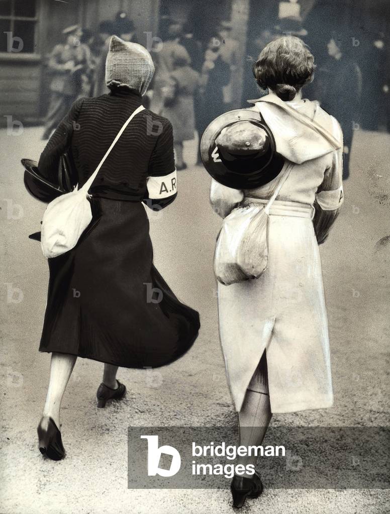 Two supervisors at the Grand National high hurdles in Liverpool