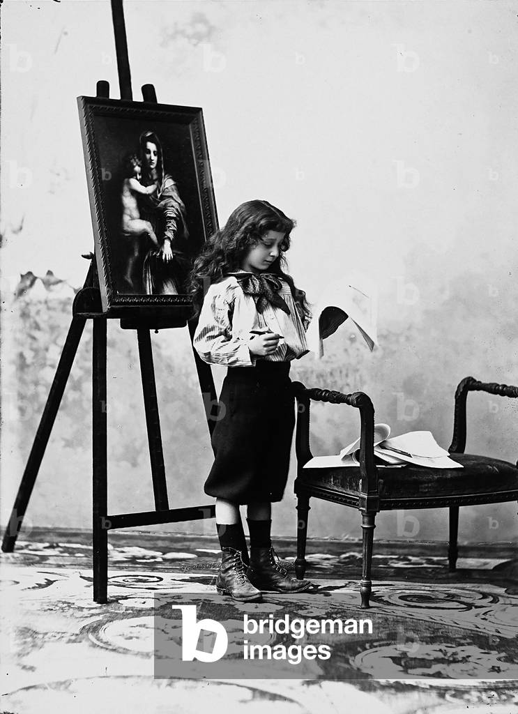 Girl in nineteenth century costume portrayed next to a picture