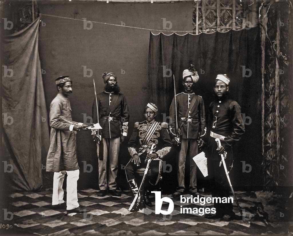The guard of Maharajah Ram Singh III, in the Royal Palace of Jaipur, India. The uniforms show the influence of English style,  1863 (print on double-weight paper)