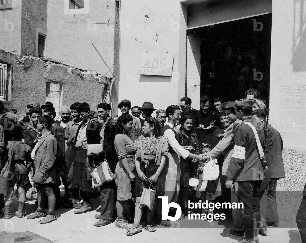 Scenes in Region IV: A.M.G. Food distribution point, 05/1944 (b/w photo)