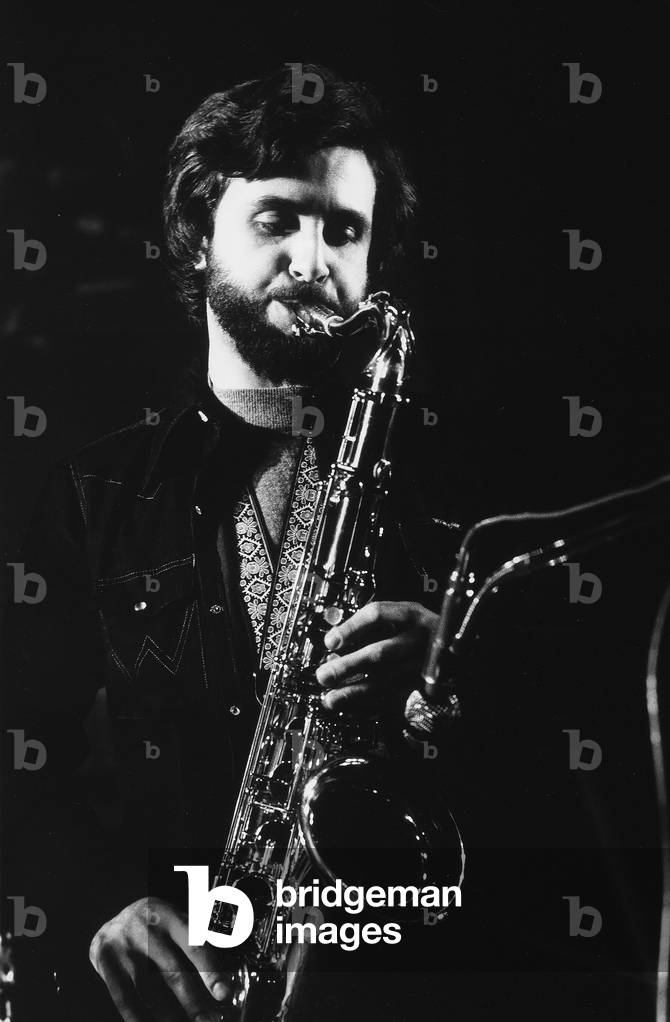 Portrait of Maurizio Giammarco playing the saxophone.