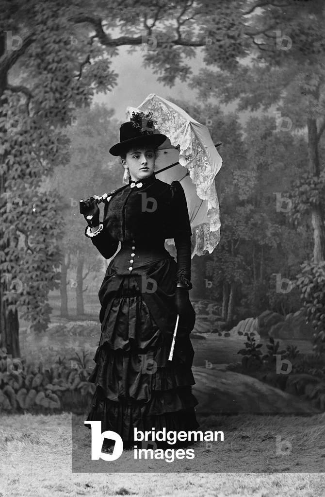 Portrait of woman with parasol