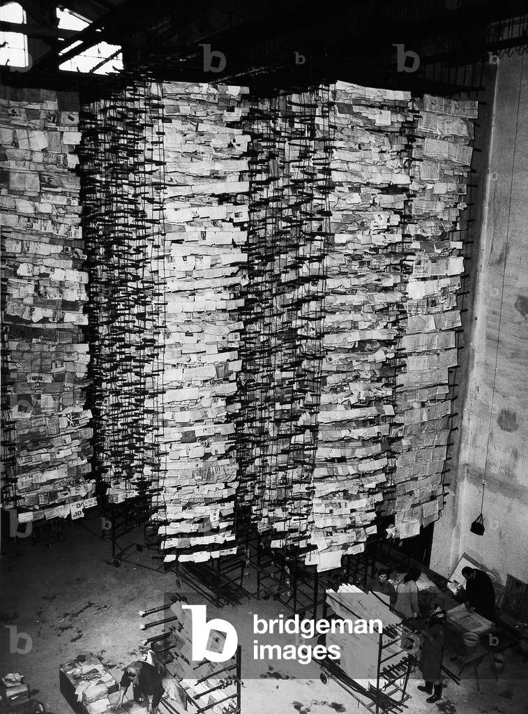 Rows of books and papers from the National Library salvaged after the flood of Florence, 4th November 1966 (b/w photo)